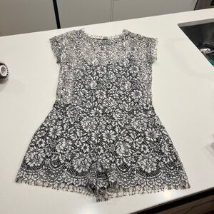 CHIC Lace romper ( from Supertrash). Black and white size 36.   60$